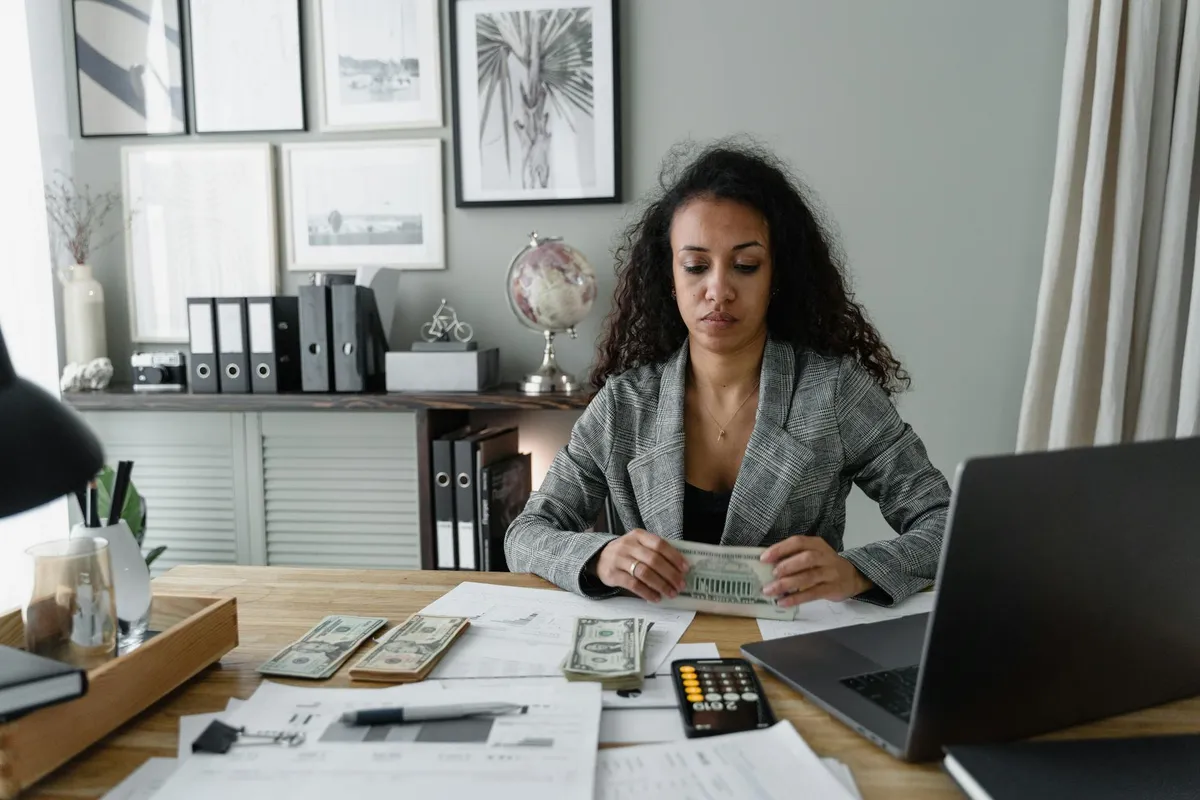 A small business owner reviewing cash flow statements